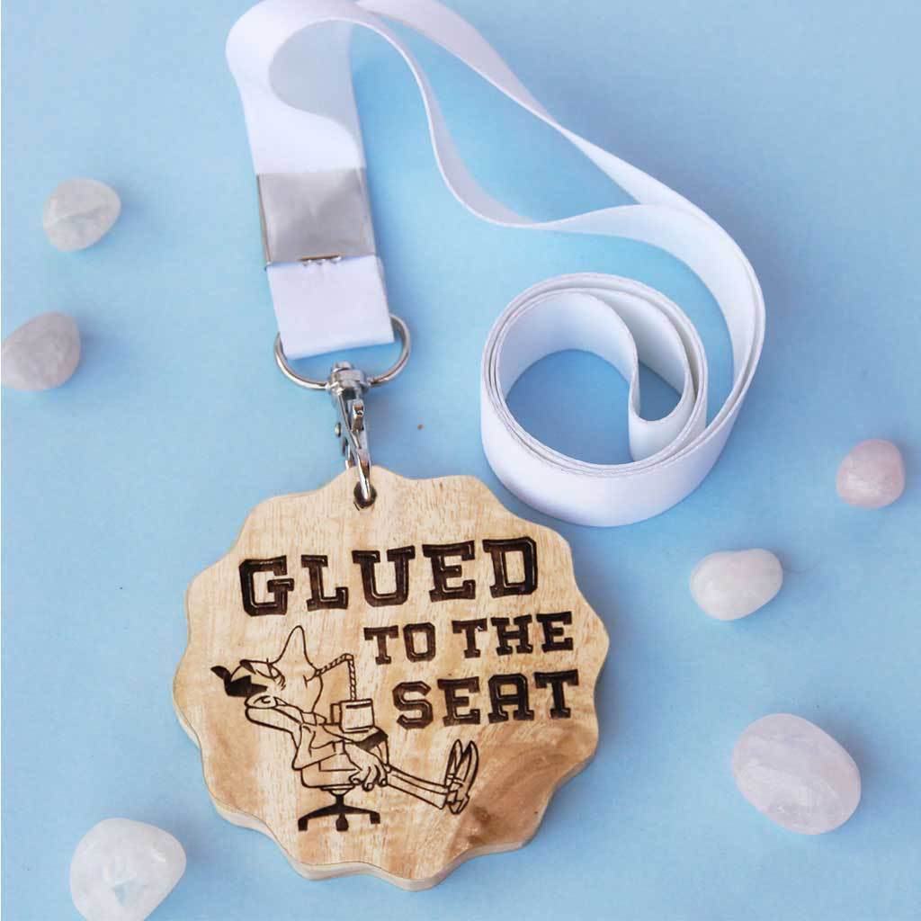 Glued To The Seat Wooden Medal